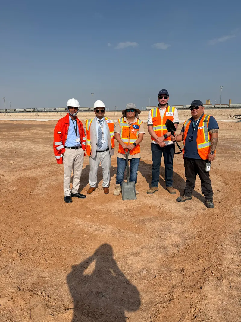 Engineers in high-visibility vests on a site during field training