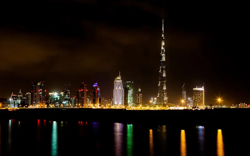 Dubai skyline at night with Burj Khalifa